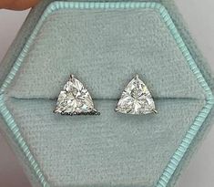 Elegant Trillion Cut Stud Earrings, Luxurious 7.5MM Trillion Cut Colorless Moissanite Diamond Earrings, Claw Prong Wedding Earring, 10k Gold ✹✹𝐖𝐞𝐥𝐜𝐨𝐦𝐞 𝐭𝐨 𝐂𝐫𝐚𝐳𝐲𝐃𝐢𝐚𝐦𝐨𝐧𝐝𝐬𝐂𝐨✹✹ Detail about stones Moissanite & Simulated Stone: ----------------------------- Stone Shape: Trilliant Cut Stone Size: 7.50 mm Weight: 2.42 TCW Color: Colorless Cut: Excellent Clarity: VVS ★ 𝑰𝒕𝒆𝒎 𝑫𝒆𝒕𝒂𝒊𝒍𝒔:- ☛ Metal Purity: Solid Gold (10KT, 14KT, 18KT); Silver(925 Sterling, 935 Argentium), 950 Platinum ☛ Metal Tone: Yellow, White, Rose ☛ Stamp/Hallmark: Yes ★ 𝑪𝒖𝒔𝒕𝒐𝒎𝒊𝒛𝒂𝒕𝒊𝒐𝒏:- ☛ Customized Design Jewelry. ☛ All cuts which you dream to make with moissanite. ☛ Updating every step of your ordered jewelry(Loose Stone, CAD & Making Process) ☛ All listed items in our stores are made Gia Certified Trillion Cut Jewelry For Formal Occasions, White Gold Marquise Cut Diamond Wedding Earrings, Marquise Cut White Gold Diamond Wedding Earrings, Marquise Cut White Gold Diamond Earrings For Wedding, Gia Certified White Gold Pear-shaped Earrings, Gia Certified Pear-shaped White Gold Earrings, Wedding Pear-shaped Diamond Earrings In Platinum, Pear-shaped Platinum Diamond Earrings For Wedding, Marquise Cut White Gold Earrings With Prong Setting