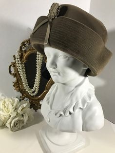 "Vintage 60s Lucila Mendez velvet hat, Vintage1960s Lucila Mendez velvet pillbox hat, Vintage accessories, vintage unique hat, dress hat.  This hat is a neutral taupe color made of velvet with braided ribbon front detail. Height 4.5\" Inside circumference 22\"" Braided Ribbon, Large Brim Hat, Types Of Hats, Velvet Hat, Unique Hats, Cocktail Hat, Dress Hat, Pillbox Hat, Accessories Vintage