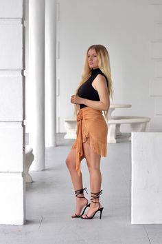 Our nutmeg colored tassel skirt is a stylish yet fun fall fashion piece Can be worn with a white or black top for a a sleek look Pair with strappy sandals for a festive feel Fast and free shipping in the United States. Items will arrive within 3-5 days Tassel Skirt, Sleek Look, Fall Fun, Black Top, Strappy Sandals, Fall Fashion, A A, The United States, High Low Dress