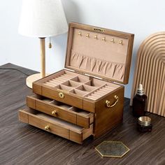 This elegant Wooden Jewelry Box is a spacious organizer designed to store and protect your precious jewelry. Featuring a secure lock, it ensures your items stay safe, while its compartments provide ample space for rings, necklaces, bracelets, and more. The timeless design makes it a thoughtful gift for women and girls, perfect for weddings, anniversaries, or special occasions like Mother's Day. Personalize it for an extra special touch, making it not just a storage solution, but a cherished keep Large Jewelry Organizer, Luxury Jewelry Box, Lock Jewelry, Custom Jewelry Box, Necklace Storage, Jewelry Organizer Storage, Wooden Jewelry Box, Wooden Accessories, Wood Jewelry Box