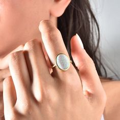 Opal Ring, Vintage Opal Ring, Minimalist Ring, Mother's Day Gift, October Birthstone Ring, Stacking Ring, Gift For Her Elevate any look with our Vintage Opal Ring. This minimalist piece exudes timeless charm, making it a perfect gift for Mother's Day or October birthdays. Crafted with care, its iridescent opal centerpiece adds a touch of elegance to any outfit. Stack it or wear it solo for understated luxury. A beautiful minimalist piece to have in ones collection 🎀 Free Returns and Money-back Opal Gemstone Stackable Rings Gift, Opal Gemstone Stackable Gift Rings, Fine Jewelry Opal Ring As A Gift, Fine Jewelry Opal Ring With Round Band As Gift, Oval 14k Gold Enamel Gift Ring, Oval 14k Gold Enamel Ring Gift, 14k Gold Opal Open Ring Gift, 14k Gold Open Opal Ring Gift, Oval Moonstone Ring In Fine Jewelry Style