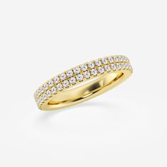 a yellow gold ring with rows of diamonds