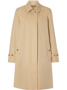 Beige cotton Gabardine car coat from Burberry featuring concealed front fastening, classic collar, long sleeves, belted cuffs, central rear vent, straight hem, mid-length and Vintage Check-pattern lining. POSITIVELY CONSCIOUS: By buying this cotton product from Burberry, you’re supporting more responsibly grown cotton through the Better Cotton Initiative.. | Burberry Gabardine car coat Burberry Raincoat, Burberry Outfit, Beige Coat, Monochrome Fashion, Car Coat, Coat Outfits, Fashion Brand, Timeless Fashion, Coats For Women