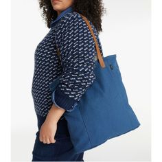 A classic market tote for errands or every day, in lightweight yet rugged canvas. They designed it with innovative leather handles so it's 100% machine washable. Specs: Dimensions: 15"L x 14"W x 3.5"D. Handle: 10.5". Capacity: Approx. 1,098 cu. in., 18 L. Weight: 0.8 lb. Fabric & Care: 60% recycled cotton, 40% cotton. Washed canvas fabric. Leather handles with grosgrain ribbon backing. Machine wash cold separately, no agitator, line dry. Construction: Single main compartment. One zippered pocket Casual Everyday Canvas Bag For Fall, Casual Everyday Fall Canvas Bag, Everyday Weekender Bag With Double Reinforced Handles, Casual Canvas Tote Bag With Canvas Lining, Casual Canvas Tote Bag With Lining, Casual Canvas Satchel With Canvas Lining, Rectangular Canvas Bag For Everyday Fall Use, Rectangular Canvas Bag For Fall, Casual Cotton Shoulder Bag For Fall