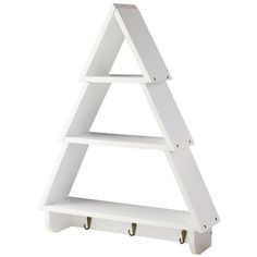 a white shelf with two hooks on the bottom and one hanging from it's side