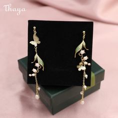 Brand: Thaya  Chain material: Silver Needle,Copper  Pattern: Flower  Gender: Female  Time to market: Fall 2021 Gold Cleaner, Butterfly And Flower, Silver Cleaner, Pattern Flower, Loose Stones, Delicate Jewelry, Flower Earrings Studs, Flower Studs, Flower Earrings