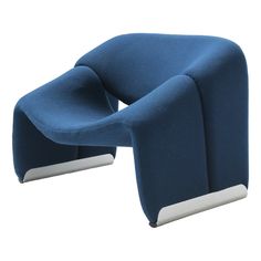 a blue chair with metal legs and an armrest that is bent to the side