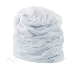 a white mesh bag filled with lots of white fabric on top of a white surface