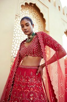 Red raw silk floral embroidered lehenga with thread work and sequence detailing paired with scallop edge v neck elbow sleeve heavily embroidered blouse and matching tulle dupatta with embroidered border and all over badla .From Chamee and Palak's The Romantics collection.DELIVERY TIMEPlease allow 8-12 weeks for your outfit to arrive.FABRIC DETAILSRaw Silk and Net Professional cleaning only. Resort Wear Men, Sharara Gharara, Embroidered Lehenga, Embroidered Border, Nehru Jackets, Scallop Edge, Sharara Set, Western Wedding, 12 Weeks