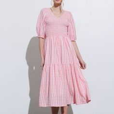 This Checkered Midi Dress Is A Beautiful Pink Is Bright And Happy. With A V Neck It Also Has A Smocked Top And Beautiful Balloon Sleeves. Being 50% Rayon, The Soft Nature Of It Makes For A Luxurious Feel. Runs Contemporary Sizing So Mommy Approved! * Smocked Bodice * Ruffle Detail * Full Lining * Midi Length * Textured Woven Fabric * 50% Rayon 50% Polyester Gingham Midi Dress, Pink Gingham Dress, Flair Dress, Smocked Top, Pink Gingham, Black Sleeveless Dress, Midi Shirt Dress, Gingham Dress, 15 Dresses