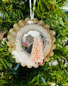 an ornament hanging from a christmas tree