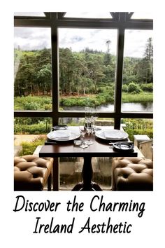 a table with plates and glasses on it in front of a window that reads, discovering the charming ireland aesthetic