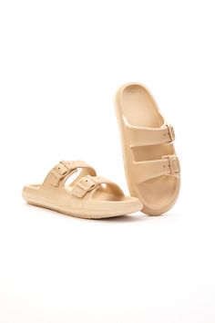 Discover the ultimate in comfort with Maibulun's Marshmallow Step Double Strap Sandals. These lightweight sandals feature a soft cushion and anti-slip sole for all-day wear. And with anti-odor material, your feet will stay fresh and comfortable. Perfect for any casual occasion. 0.98" Heel Slip-on / Buckle closure 100% pure thermoplastic upper 100% Thermoplastic Inner 100% Thermoplastic Sole Feature: Ultimate lightweight soft cushion. Anti-slip bulge sole™. Anti-odor tech material™. Beige Non-slip Flat Sandals, Beige Cushioned Slide Flip Flops, Beige Cushioned Flip Flops, Beige Cushioned Flat Flip Flops, Beige Non-slip Synthetic Sandals, Comfortable Lightweight Flat Sandals, Beige Flat Synthetic Jelly Sandals, Flat Beige Synthetic Jelly Sandals, Comfortable Beige Flip Flops With Cushioned Footbed