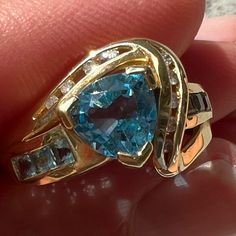 14k Yellow Gold Blue Topaz Diamond Ring In A Size 7. It Looks Brand New. It Sparkles So Much! It Weighs Approximately 4.33 Grams. The Inside Is Stamped 14k Cgj. Box Not Included. Inventory 11 Trillion Cut Topaz Jewelry For Anniversary, Formal Trillion Cut Topaz Ring In Fine Jewelry Style, Formal Trillion Cut Topaz Fine Jewelry Ring, Luxury 14k Gold Topaz Ring With Accent Stones, Fine Jewelry Trillion Cut Topaz Ring, Fine Jewelry Topaz Ring With Trillion Cut, Fine Jewelry Topaz Ring With Trillion Cut Gemstone, Blue Trillion Cut Ring Fine Jewelry, Blue Trillion Cut Rings In Fine Jewelry