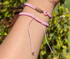 Evil Eye 🧿 Beaded Bracelet In many cultures, it is believed that evil eye bracelets protect against misfortune, evil looks and negative energy. Wear your bracelet for good luck and protection. ✨ Pink Evil eye protects your friendships and exhibits a calming, relaxing feeling. ✨ Pink Evil Eye Bracelets, Pink Friendship Bracelet, Evil Eye Jewelry Bracelet, Evil Eye Stone, Pink Veil, Popular Jewelry, Evil Eye Bracelet, Pink Bracelet, Evil Eye Jewelry