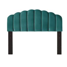 an upholstered headboard with black legs and green velvet fabric, on a white background