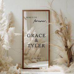 there's to forever grace and tyler sign in front of some pamodia