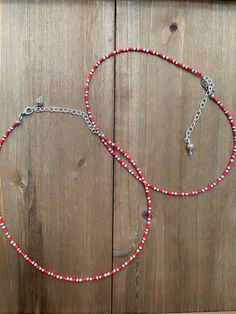 "POPPIES These extendible necklaces are inspired by the colors found in New England. From flowers and trees to rocks and water, every color combination comes from what I see around me on the New England coast.  At their shortest these chokers are 14\" and each extends to about 16\"+." Adjustable Red Beaded Necklace With Letter Beads, Adjustable Red Beaded Letter Necklaces, Adjustable Red Necklace With Letter Beads, Red Beaded Necklaces With Letter Beads, Red Beaded Necklace With Letter Beads, Red Beaded Necklace With Letter Beads For Jewelry Making, Red Necklaces With Round Letter Beads, Red Heishi Bead Necklaces, Red Heart Beads For Beach