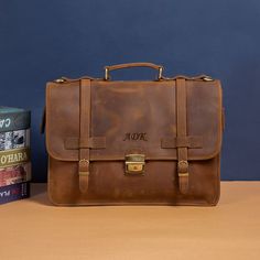 "ABOUT THE ITEM:   - This briefcase is made of 100% full grain leather. - The briefcase dimensions  is  15.7 X 11 X 5.5 Inches - Solid metal zipper, high quality metal hardware - Briefcase comes with a large adjustable shoulder strap (33\"-58\"). - Briefcase fits laptops, tablets and devices up to 15 inches." Laptop Briefcase, Leather Laptop Bag, Briefcase For Men, Leather Laptop, Mens Leather Bag, Leather Notebook, Nice Leather, Metal Zipper, Custom Leather