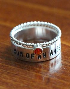 Memorial Ring- Mom of an Angel- Personalized Ring- Birthstone Ring- Sterling Silver- Hand Stamped- Mommy of an Angel- Stackable Ring by kandsimpressions on Etsy https://www.etsy.com/listing/266550363/memorial-ring-mom-of-an-angel Inspirational Silver Rings For Anniversary, Spiritual Sterling Silver Engraved Ring For Anniversary, Spiritual Anniversary Engraved Ring, Personalized Silver Engraved Ring For Mother's Day, Sterling Silver Engraved Name Ring For Anniversary, Engraved Name Ring For Anniversary And Mother's Day, Silver Birthstone Ring With Names In Sterling Silver, Personalized Sterling Silver Stackable Rings For Anniversary, Silver Sterling Birthstone Ring With Names