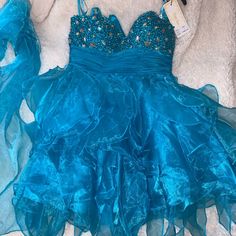 Homecoming Dress Mmy Daughter Never Use It I Paid $180 Blue Ruffles Fitted Bodice Mini Dress, Blue Mini Dress With Ruffles And Fitted Bodice, Blue Dresses For Prom Season, Light Blue Evening Dress For Homecoming And Prom, Light Blue Evening Dress For Homecoming During Prom Season, Blue Evening Dress For Homecoming And Party Season, Blue Evening Dress For Homecoming Party Season, Light Blue Prom Dress With Fitted Bodice, Blue Mini Dress For Wedding And Prom Season