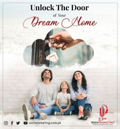 a family sitting on the floor with their keys in front of an open door that says, unlock the door of your dream home