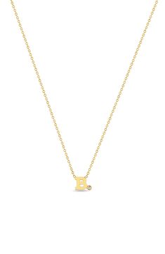 A single bezel-set diamond punctuates the letter of your choosing on this 14-karat-gold necklace. 14" length; 2" extender; 1mm band width; 5.5mm pendant height Total diamond weight: 0.01ct. Color: F–G Clarity: SI1–SI2 14k gold/diamond Made in the USA >Diamond Guide Gold Initial Necklace With Single Diamond For Gifts, Classic Initial Necklace With Single Diamond For Gift, Classic Initial Necklace With Single Diamond, Yellow Gold Initial Necklace With Single Diamond For Anniversary, Gold Initial Necklace With Single Diamond For Anniversary, Classic Initial Necklace With Single Diamond For Anniversary, Zoe Chicco, Diamond Guide, Initial Pendant Necklace