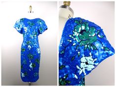 "This is a fully embellished vintage dress covered in bright blue and green sequins. The material is 96% cotton and 4% spandex, so there's is a little stretch in the material. It's in perfect condition! Measurements are taken not stretched and stretched: Size MEDIUM Measurements: Bust - 36-40\" Waist - 28-32\" Hips - 36-40\" Length - 43\" Size XL Measurements: Bust - 40-44\" Waist - 32-36\" Hips - 40-44\" Length - 43\" This dress comes from a pet-free and smoke-free home. If you would like more Fitted Blue Dress With Contrast Sequin, Blue Embellished Sequin Summer Dress, Blue Embellished Sequin Dress For Summer, Fitted Blue Sequin Summer Dress, Blue Fitted Sequin Dress For Summer, Fitted Blue Sequin Dress For Summer, Fitted Blue Sequin Dress With Contrast Sequins, Fitted Sequin Dress With Short Sleeves For Summer, Blue Contrast Sequin Summer Dress