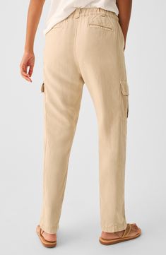 Comfy cargo pants for kicked-back days are cut from linen-kissed twill with an elastic waistband and roomy pockets lending a cool utility vibe. Zip fly with button closure; elastic waist Front and back welt pockets; cargo patch pockets 49% Tencel® lyocell, 28% linen, 21% cotton, 2% elastane Tencel lyocell is a more-sustainably produced fiber made with closed-loop processing Machine wash, tumble dry Made in Turkey Khaki Linen Cargo Pants With Pockets, Beige Linen Cargo Bottoms, Summer Utility Cargo Pants With Tapered Leg, Casual Linen Pants With Multiple Pockets, Beige Casual Cargo Pants With Flap Pockets, Utility Linen Cargo Pants With Cargo Pockets, Summer Linen Cargo Pants With Patch Pockets, Elastic Waistband Linen Cargo Pants, Relaxed Fit Linen Cargo Pants With Pockets