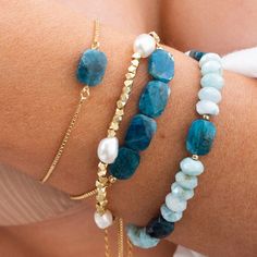 Our Apatite Gemstone Bracelet features beautiful blue gemstones on a dainty gold bracelet that is adjustable, making it the perfect fit for any wrist size. Show off your style with this stunning bracelet and enjoy the compliments you are sure to receive! Dainty Stone Bracelet, Blue Stackable Bracelets, Stone Jewelry Bracelets, Stones Bracelets Ideas, Natural Stone Beaded Bracelets, Natural Stone Bracelet Ideas, Gemstone Bracelets Ideas, Pull Bracelet, Stone Bead Bracelets