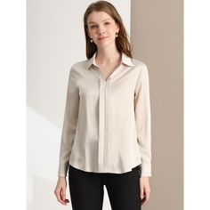 The smooth, soft, and minimalist design updates this collared no-buttons shirt for understated charm. This seriously chic long-sleeve shirt is the perfect way to elegantly elevate any outfit. This simple shirt is an elegant take on a wardrobe classic, featuring a stylish v-neckline. The charm of women is shown perfectly at this moment. In a red smooth fabric, this can be styled up or down whatever the occasion. Just tuck the front into black or white pants for an office day. Spring Business Blouse With Lapel Collar, Chic Business Casual Blouse With Lapel Collar, Versatile Solid Color Blouse For Office, Versatile Solid Color Office Blouse, Chic Blouse With Lapel Collar For Office, Chic Office Blouse With Lapel Collar, Sleek Tops With Lapel Collar For Workwear, Versatile Solid Color Workwear Blouse, Chic Collared Business Casual Shirt