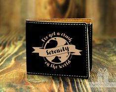 there is a wallet that says like not a casual serenity all the wrong ways