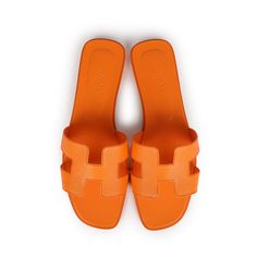 This pair of Oran sandals are in Orange Sunset epsom leather, H cutout detail, Natural leather insole, natural leather sole, in size 42 EU.Origin: ItalyCondition: New and never wornAccompanied by: Hermes box, dustbagsSize: 42 EU Orange Hermes Sandals, Orange Sandals With Rubber Sole For Spring, Orange Leather Sandals For Vacation, Spring Orange Sandals With Rubber Sole, Orange Flat Sandals With Rubber Sole, Flat Orange Sandals With Rubber Sole, Orange Leather Open Heel Mules, Vacation Slides With Leather Sole And Flat Heel, Vacation Slides With Leather Sole