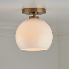 a light fixture hanging from the ceiling in a room