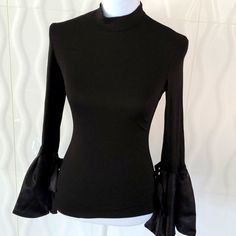 Asos Black Mockneck Top With Large Bell Sleeves With Tie. Bell Sleeves Are A Satin Fabric. Dressy Size Xs. Never Worn! Asos Tops, Mock Neck Top, Satin Fabric, Mock Neck, Bell Sleeves, Asos, Womens Tops, Satin, Fabric