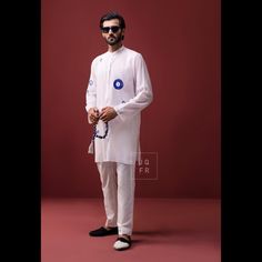 This white Kurta, perfect for Eid, is crafted with 100% cotton, ensuring both comfort and style. Made with great care, its simple yet beautiful design captures the essence of the celebration. The pure cotton fabric promises breathability and a soft touch, making it ideal for the festive occasion. Paired with it is a sophisticated 5-pocket trouser, blending traditional elegance with modern convenience. This combination not only adds a contemporary twist but also offers practicality, ensuring you have enough space for your essentials while participating in the Eid festivities. This attire is more than just clothes; it's a medium to unite and celebrate together, embracing the warmth and happiness that Eid brings. White Cotton Kurta With Relaxed Fit, White Casual Kurta With Relaxed Fit, Casual White Kurta With Relaxed Fit, White Casual Relaxed Fit Kurta, White Relaxed Fit Cotton Kurta, White Cotton Relaxed Fit Kurta, White Kurta, Eid Collection, Handmade Design