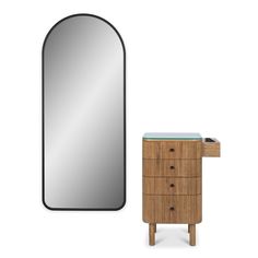 an oval mirror next to a wooden dresser with drawers and a glass top on it