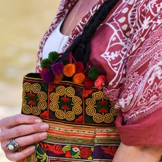 This bag makes us want to go places. Beach day, overnight or just hauling all of lifes necessities - we've got you covered, babe. This gorgeous earth tone tote bag is hobo style, so it is unstructured. We love the unique design on this travel bag plus the little pom pom's on the straps make it perfection. We know you will fall in love with our colorful boho beach bags. Handmade in Thailand with vintage Hmong embroidery that is woven by the Hmong Hill Tribes of Lanna Country (Northern Thailand). Hmong Embroidery, Tote Beach Bag, Bags Handmade, Northern Thailand, Hobo Style, Beach Bags, Beach Tote Bags, Travel Tote, Colorful Boho