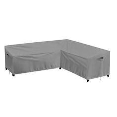 an outdoor furniture cover on top of a table