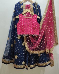 Lehenga blue with pink blouse for women.  * Plus size available at a small up-charge. * Size: This is custom made outfit as per your size. Post your order we will send you a measurements reference sheet using which you can provide details required to make your outfit with best fit. * Fabric and work: Lehenga - Embroidered Net fabric. Blouse - Heavy embroidered sequences net fabric. Dupatta - Dupatta is in net with embroidery lace border on all sides of it. Dupatta is decorated with beautiful seq Pink Semi-stitched Art Silk Dress, Party Wear Embroidered Choli With Traditional Drape, Bollywood Style Embroidered Fitted Lehenga, Fitted Sharara With Dori Work For Diwali, Pink Party Wear Blouse Piece For Festive Season, Pink Art Silk Dress With Dori Work, Fitted Diwali Dresses With Dori Work, Fitted Dresses With Dori Work For Diwali, Pink Festive Party Wear Blouse Piece