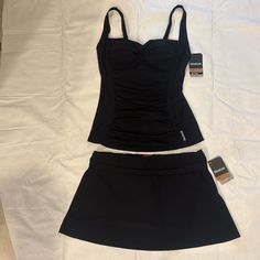 Nwt Reebok 2 Piece Swimwear Ruched Tankini With Padded Bra Swim Skirt Size Small Made In Vietnam Fitted Black Swim Skirt For Workout, Fitted Skirted Swim Skirt For Sports, Sporty Fitted Black Swim Skirt, Sporty Fitted Swim Skirt, One Piece Swimsuit Shorts, Midsize Swimwear, Swimsuits With Skirt, Swimwear 2 Piece, Swimsuit With Skirt