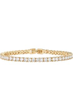 Description The ultimate classic. This timeless, beautiful, elevated tennis bracelet is a necessity for every woman's jewelry box. The perfect statement bracelet that can be worn every day or stacked with other pieces. Materials 14K yellow gold, rose gold or white gold plated AAAAA Cubic Zirconia Stone size: 3mm Sizes: 6.5"; 7"; 7.5" Hypoallergenic; nickel, lead, and cadmium free Tennis Bracelet Gold, Dainty Wedding, Gold Bracelet For Women, Gold Bracelets, Elegant Bracelet, Stackable Bracelets, Rose Gold Bracelet, Watches Women Fashion, Statement Bracelet