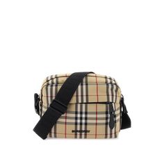 Paddy Crossbody Bag By Burberry Made Of Nylon Canvas With Iconic Check Pattern With Lettering Logo Applied At Front And Contrasting Trims. Main Compartment With Zip Closure, Fabric-Lined Interior, Front Zip Pocket, Back Pocket With Magnetic Button. Adjustable Fabric Shoulder Strap With Tone On Tone Jacquard Logo, Matt Black Metal Hardware. Materal: 100% Pa. Made In: Romania. Color: Beige. Collection: Fall - Winter 2023. Sku: 8069760. Width: 22,5 Cm Height: 16 Cm Depth: 6,5 Cm Shoulder Strap: 99 Lettering Logo, Latest Fashion Design, Tone On Tone, Womens Crossbody Bag, Burberry Bag, Metal Hardware, Check Pattern, Canvas Leather, Black Metal