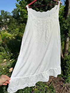 A well kept piece of handmade undergarment. Possible to wear as a light summer dress. Camisole Dress With Lace Trim For Sleep, White Camisole Beach Dress, White Cottagecore Dress For Sleep, Daywear Camisole Dress With Lace Trim, Camisole Dress With Lace Trim For Daywear, Summer Sundress With Lace Trim For Daywear, Summer Beach Slip Dress With Lace Trim, Cottagecore Summer Nightgown For Home, Cottagecore Summer Nightgown