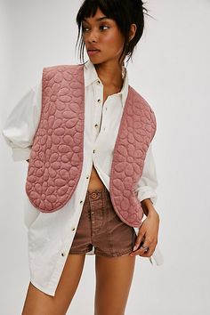 Add a sweet layer to any look with this lightweight quilted vest, featuring daisy motifs all over for a darling detail. **Fit:** Relaxed **Features:** Lightweight cotton blend, open-front style, floral quilting, round hem **Why We | Bali Folk Daisy Vest Jacket at Free People in Pink, Size: M