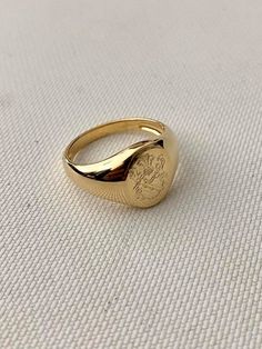 Coat of Arms Family Crest Ring, Crest Engraved ring, Personalized Ring, Pinky ring Engraved Signet ring with Oval Seal- Best quality 18k Gold Plate Great for Men or Women. Looks great on any finger, and especially cool as a pinky ring. Please note in Personalization at checkout. : The Family Crest/image you want me to engrave The product will arrive to you packed in gift box and padded envelope to maintain the product For more rings from us: https://www.etsy.com/il-en/shop/Limajewelry?section_id Signate Rings Men, Signet Ring Men Pinky, Vintage Tarnish-resistant Round Rings, Yellow Gold Engraved Wedding Ring, Vintage Sterling Silver Tarnish-resistant Signet Ring, Symbolic Oval Promise Ring, Vs Clarity Open Signet Ring For Promise, Vintage Tarnish Resistant Signet Ring For Promise, Vintage Tarnish Resistant Promise Ring