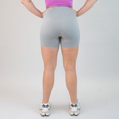 Experience unmatched comfort and style with our Biker Short 6" - No Front Seam. Embrace a seamless front design for maximum comfort and a flattering fit, and take on all of your adventures with unbeatable coverage and coziness. Imagine a comfy morning wrapped up in a cozy cloud! Heather Light Gray was made so you can feel both chic and powerful. Pair it with a matching Racerback Crop, or any color in your closet. Single lined with lined gusset No front seam 6" inseam Flat, 4.25" wide waistband H Sporty Compression Biker Shorts With Built-in Padding, Fitted Biker Shorts With 5-inch Inseam For Gym, Compression Sports Bottoms With Built-in Padding, Fitted Biker Shorts With Built-in Padding For Workout, Functional Breathable Activewear With 5-inch Inseam, Fitted Biker Shorts With Built-in Padding For Athleisure, Fitted Activewear With Built-in Shorts For Outdoor Activities, Gray Sporty Activewear With Built-in Shorts, Solid Go-dry Biker Shorts For Training