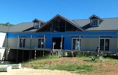 a house under construction in the middle of nowhere