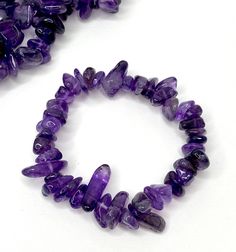 Amethyst Chips Bracelet You will receive 1 (ONE) Amethyst Chips Bracelet similar to the item in the picture Great for mixing and matching with other regular bracelets. . Amethyst has healing powers to help with physical ailments, emotional issues, and in Energy Healing and Chakra balancing. Amethyst crystal therapies are primarily associated with physical ailments of the nervous system, the curing of nightmares and insomnia, and balancing the crown chakra. FOLLOW US ON INSTAGRAM @earthsmineralsi Amethyst Beaded Bracelet For Healing, Amethyst Beaded Bracelets With Round Beads, Adjustable Purple Crystal Bracelet With Stones, Purple Spiritual Crystal Bracelet With Stones, Spiritual Purple Beaded Bracelets With Stones, Spiritual Purple Crystal Bracelet With Stones, Adjustable Purple Crystal Bracelet, Purple Amethyst Crystal Bracelet With Gemstone Beads, Purple Amethyst Stretch Bracelet With Natural Stones