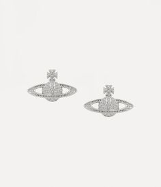 This season, our Mini Bas Relief earrings feature a classic two-dimensional orb design, elegantly outlined with shimmering crystals and finished in polished silver-tone plating. The orb, a signature motif of the house, embodies Vivienne's vision of effortlessly merging tradition with the future. Luxury Silver Earrings With Shiny Finish, Designer Silver Earrings With Polished Finish, Elegant Silver Orb Earrings, Mini Bas Relief Earrings, Aesthetic Wishlist, The Orb, Diamond Bar Necklace, 2024 Christmas, Bas Relief